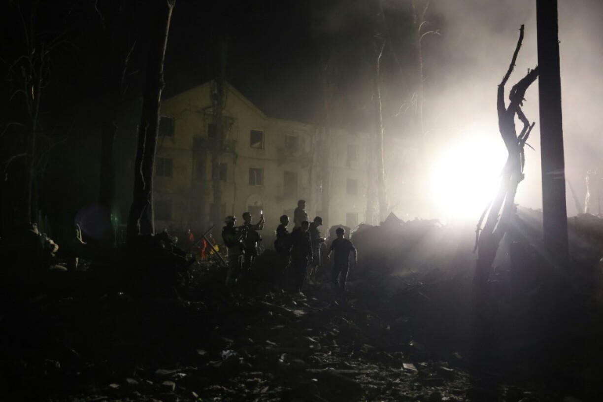 Ukrainian rescuers worked at the site of a Russian missile attack in Kyiv