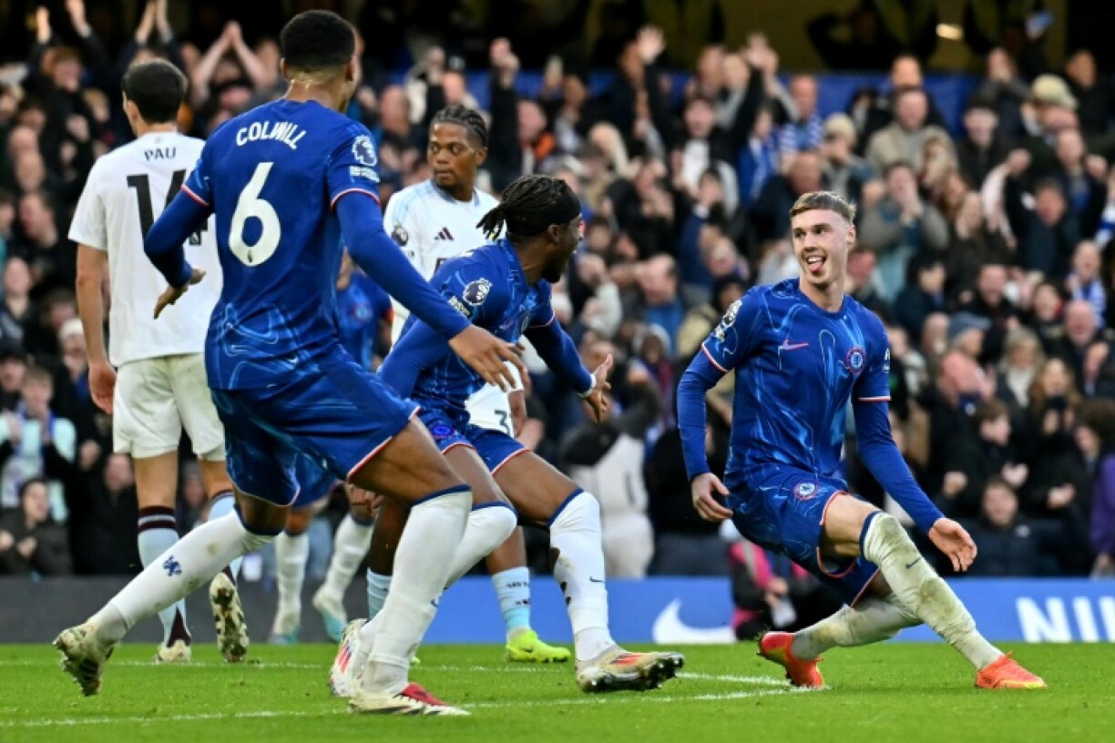 Chelsea's Cole Palmer (R) celebrates scoring against Aston Villa