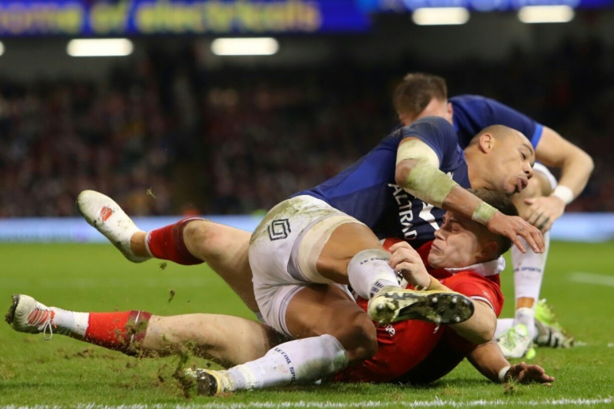 Positional switch: Joe Roberts (C) has been moved from centre to wing for Wales' Six Nations match against England in Cardiff