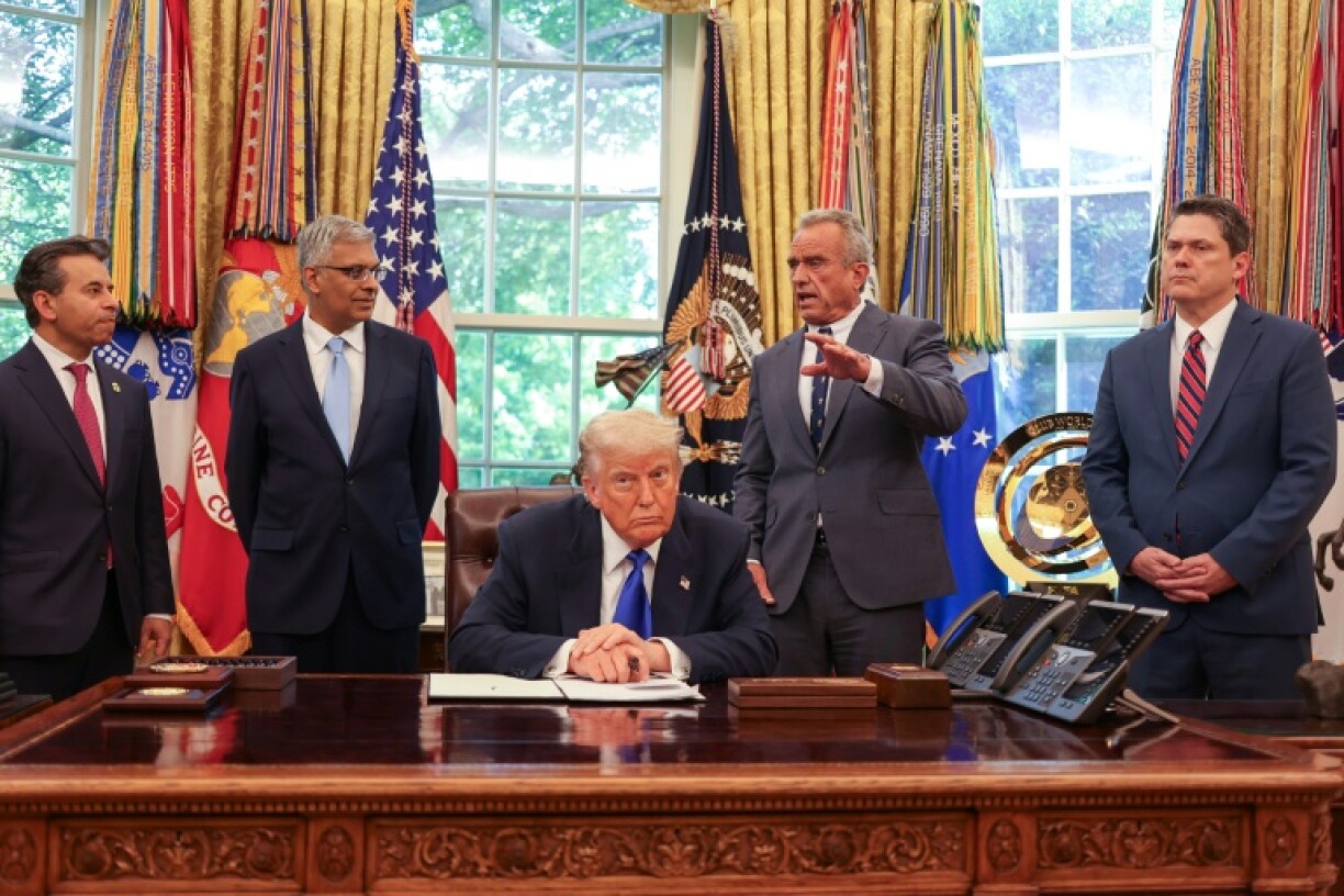 US Secretary of Health and Human Services Robert F. Kennedy Jr., speaks alongside (L-R) Food and Drug Administration Commissioner Martin Makary, Director of the National Institutes of Health Jayanta Bhattachary, President Donald Trump