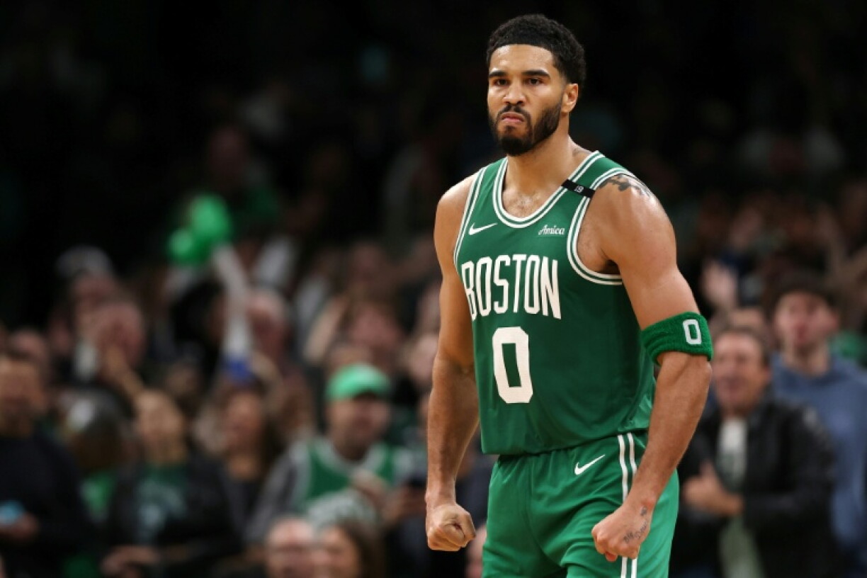 Jayson Tatum celebrates after scoring in the fourth quarter of Boston's victory over the New York Knicks at TD Garden