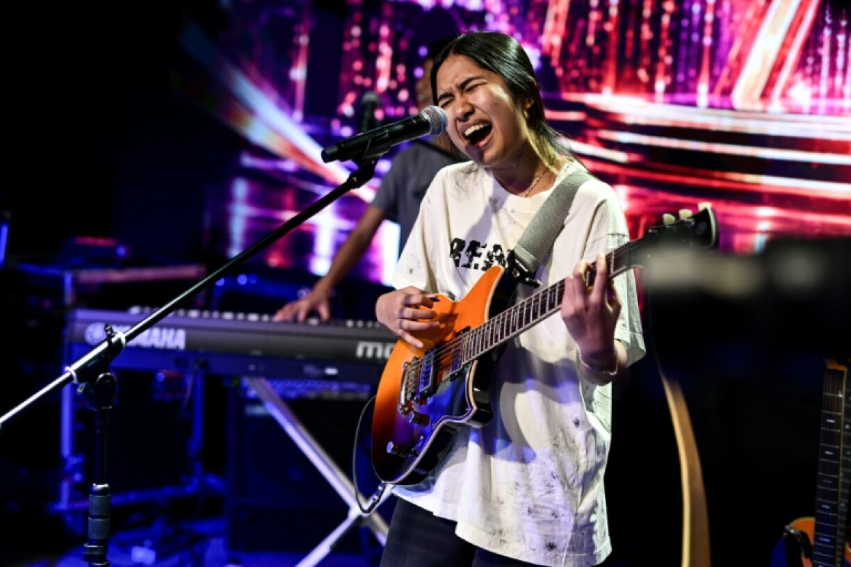 Rising Thai teen rock Nene Royal put in a brief appearance in Bangkok on September 30, days after winning the 2026 edition of "America's Got Talent"