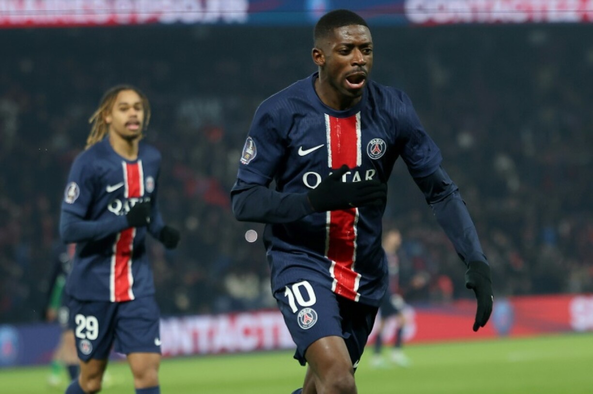 Ousmane Dembele (R) celebrates after scoring the opening goal in Paris Saint-Germain's 2-1 win over Saint-Etienne