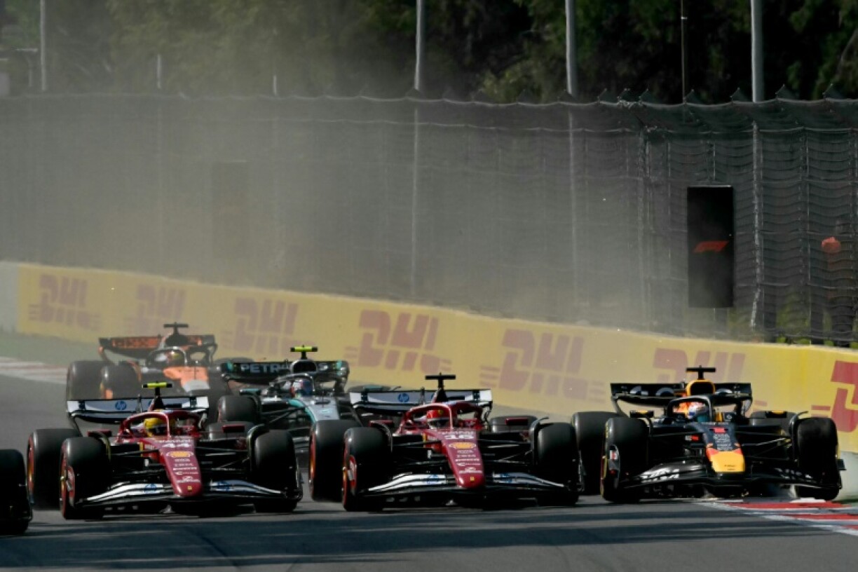 Ferrari's Lewis Hamilton and Charles Leclerc alongside Red Bull Racing's Max Verstappen during the Mexico City Formula One Grand Prix