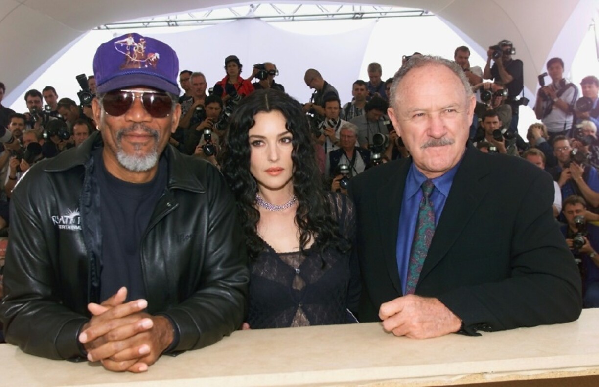 Gene Hackman (R) is seen here with co-stars Morgan Freeman and Italian actress Monica Bellucci during the photocall for