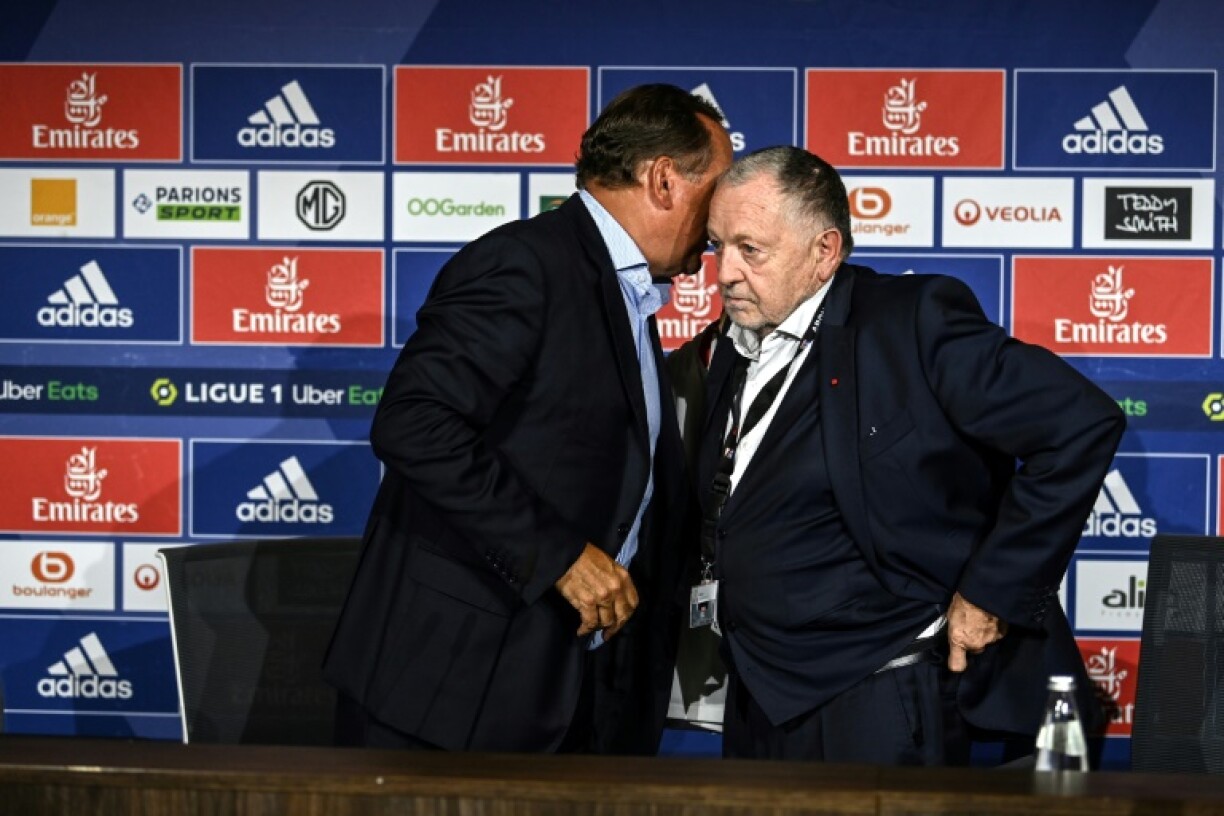 MM Jean-Michel Aulas et John Textor affichent leur complicité après l'annonce de la vente du club lyonnais, le 21 juin 2022 à Décines