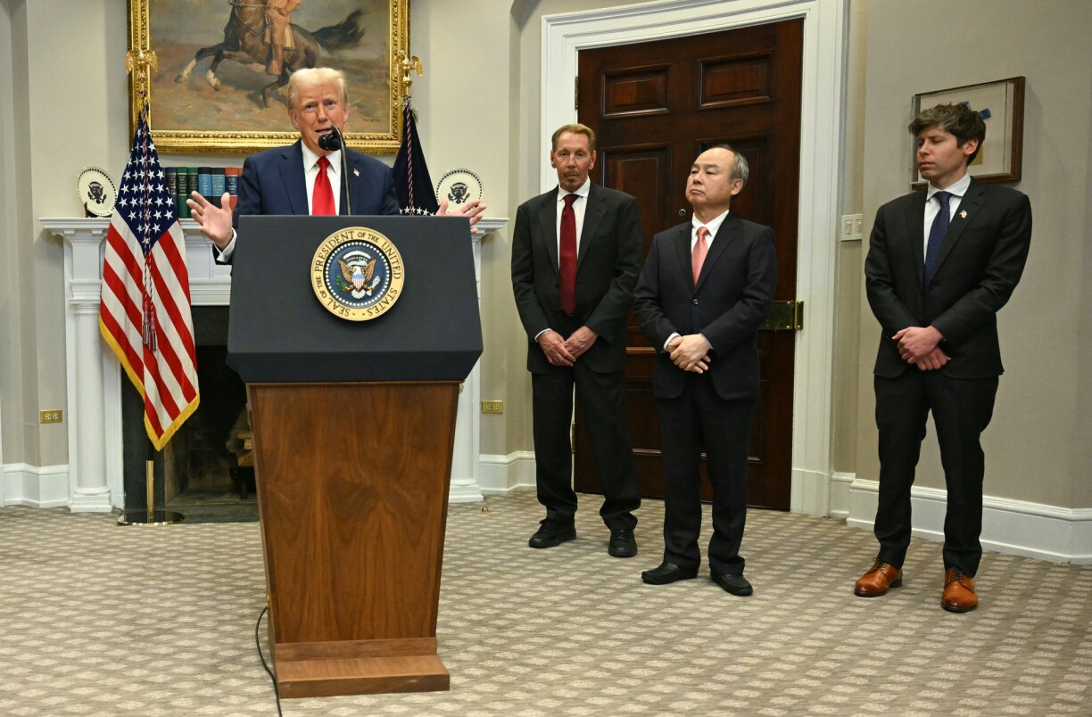 US President Donald Trump speaks in the Roosevelt Room flanked by Masayoshi Son (2R), Chairman and CEO of SoftBank Group Corp, Larry Ellison (2L), Executive Charmain Oracle and Sam Altman (R), CEO of Open AI at the White House on January 21, 2025, in Washington, DC.