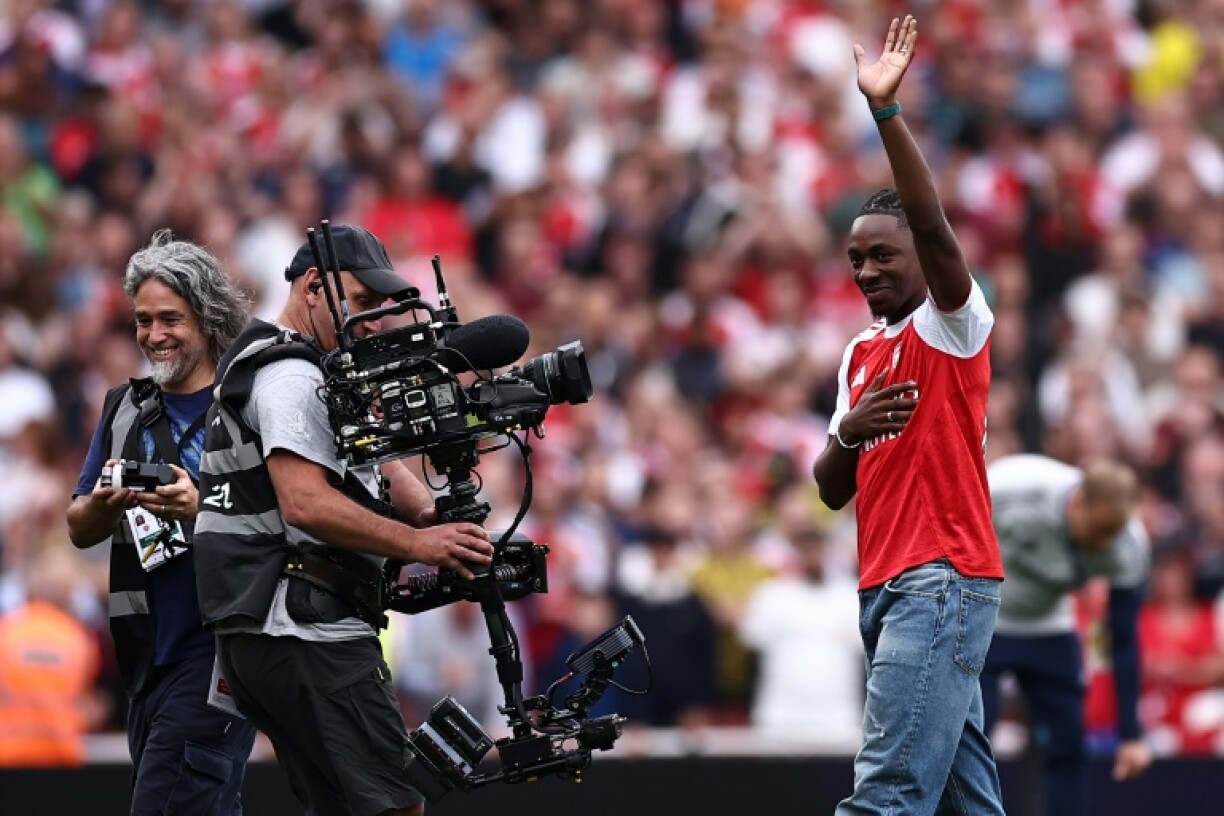New Arsenal signing Eberechi Eze waves to the crowd ahead of their game against Leeds