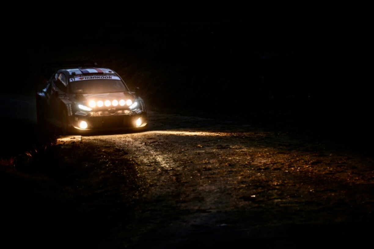 Monte Carlo Rally leader Sebastien Ogier drives through the evening on Saturday's closing stage