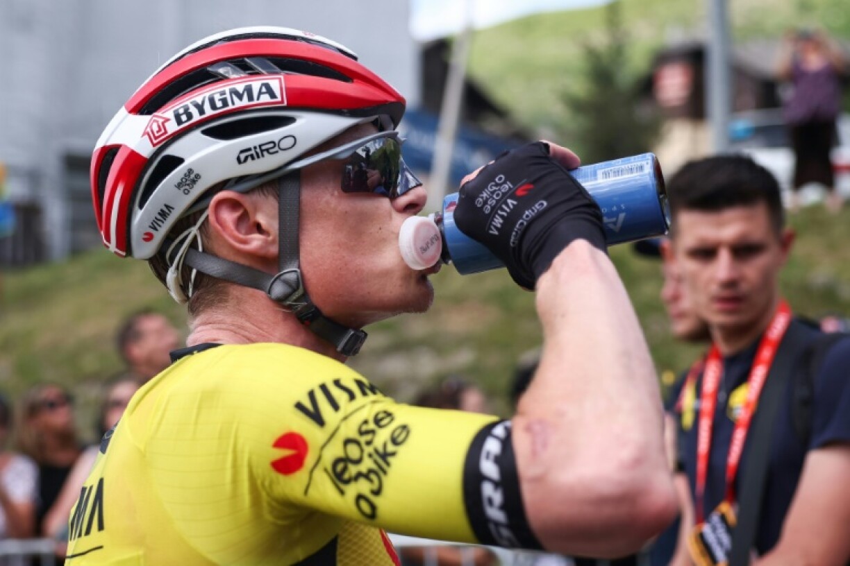 Jonas Vingegaard takes on fuel during the Criterium du Dauphine