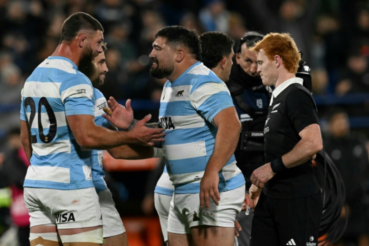 Argentina flanker Marcos Kremer celebrates with teammate Joel Sclavi after a Rugby Championship 2025 victory over New Zealand in Argentina