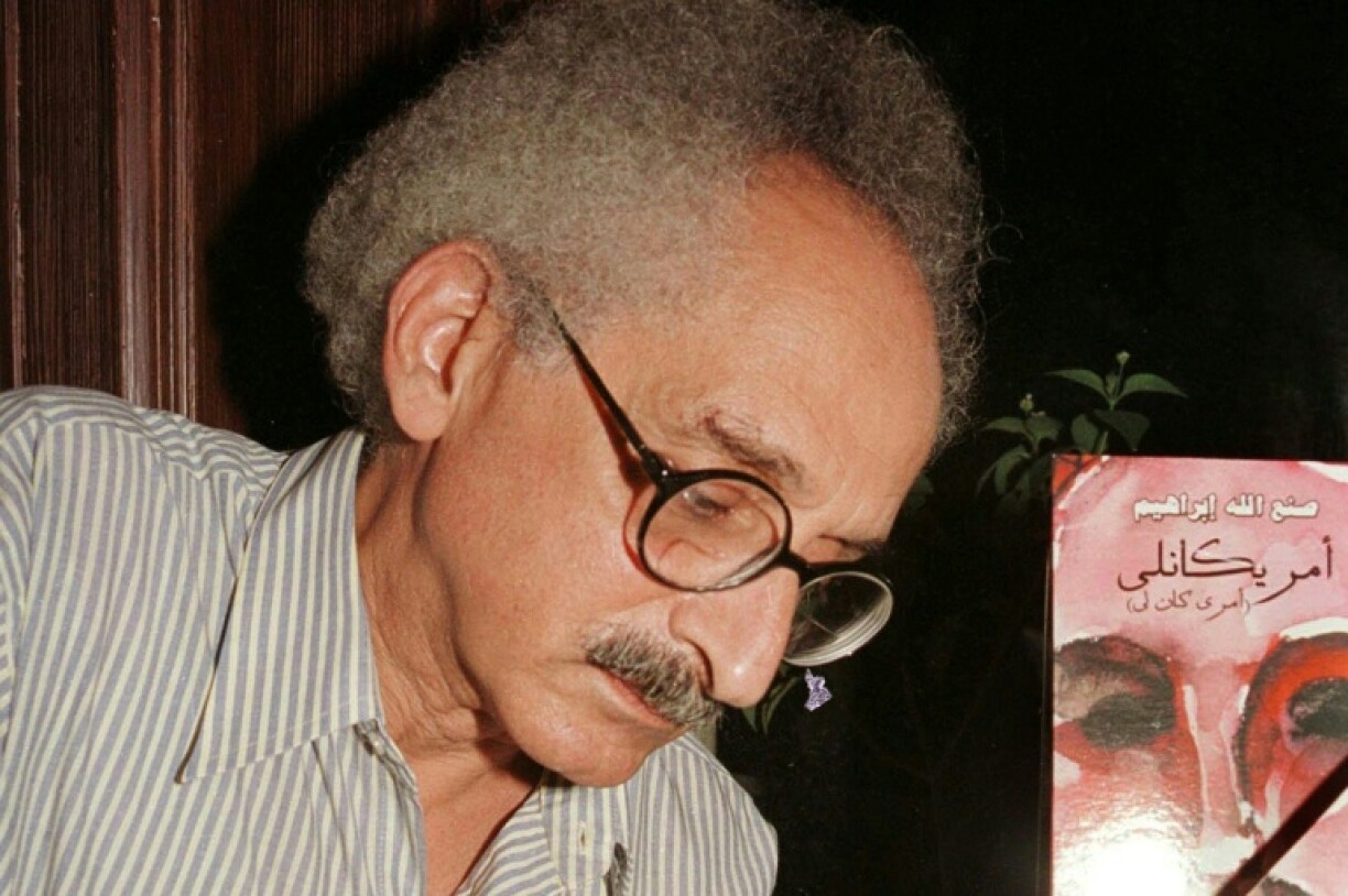 Renowned Egyptian novelist Sonallah Ibrahim, who died on Wednesday at the age of 88, is seen here at a Cairo book signing in September 2003.