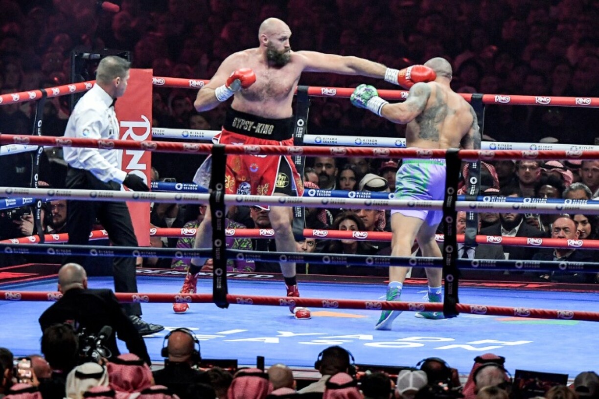 Ukraine's Oleksandr Usyk (blue) beat Tyson Fury twice in Riyadh last year