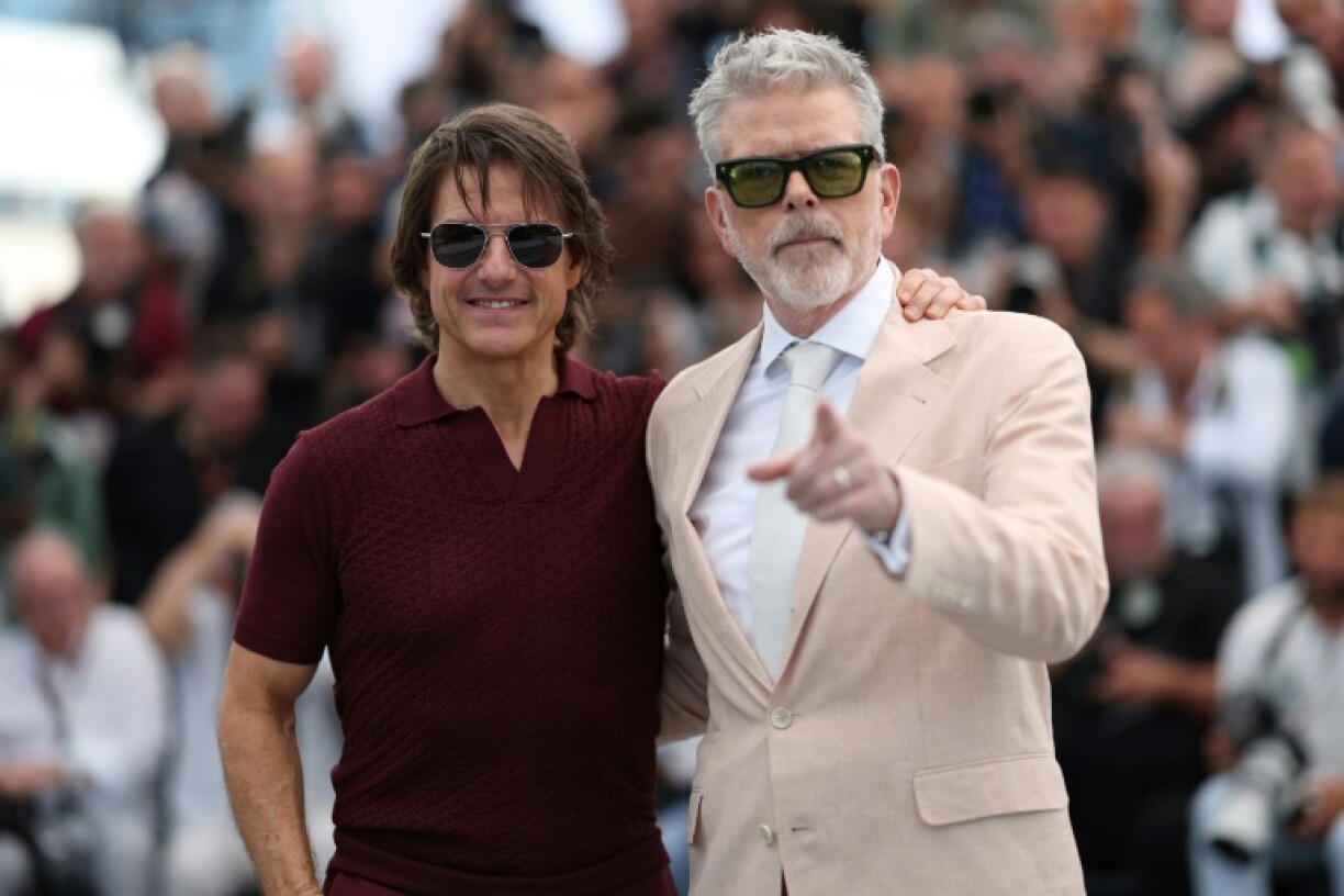 McQuarrie said the crew feared Cruise (left) had passed out during one stunt on a biplane