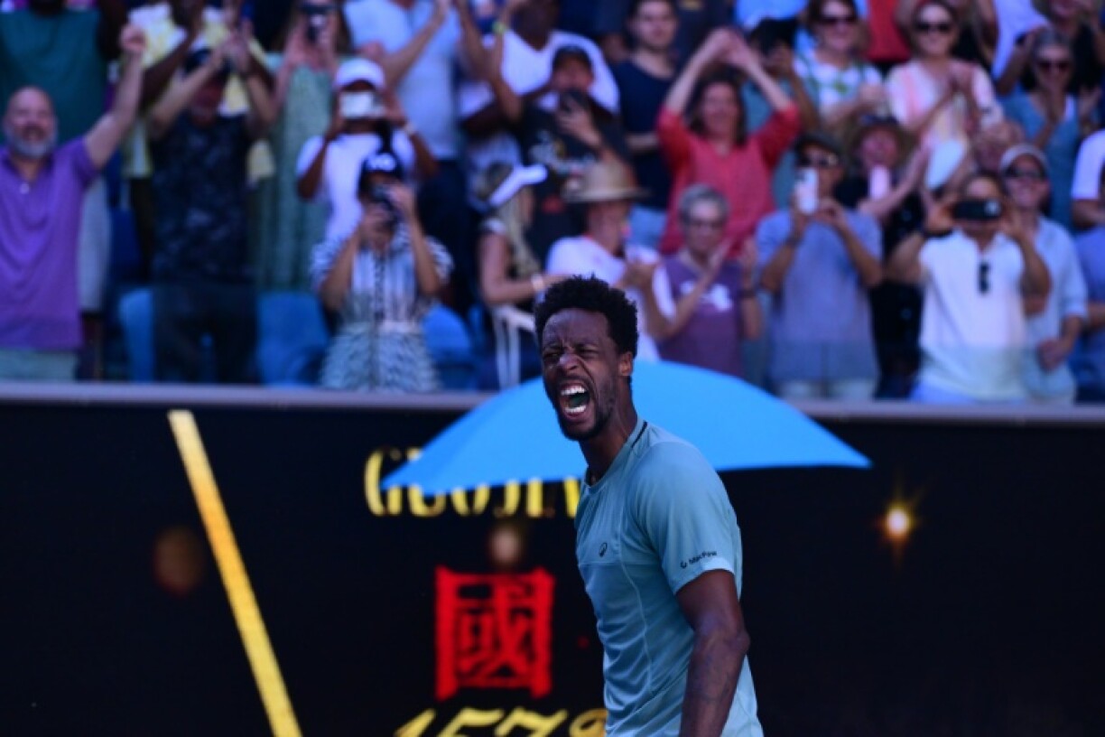 Gael Monfils celebrates after beating Taylor Fritz at the Australian Open