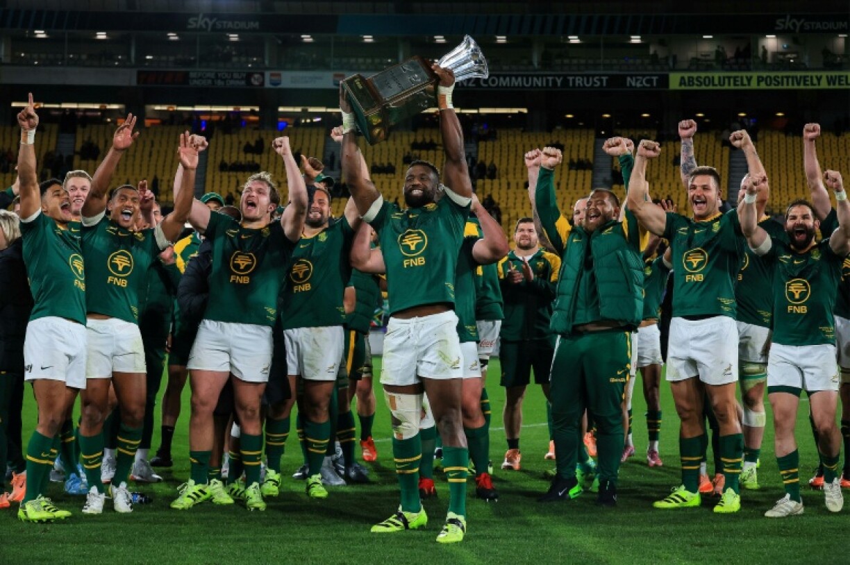 South Africa players celebrate winning the Freedom Cup during the Rugby Championship Test match between New Zealand’s All Blacks and South Africa’s Springboks at Sky Stadium in Wellington on September 13, 2025.