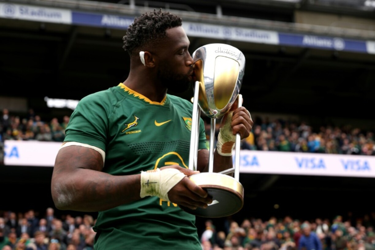 South Africa captain Siya Kolisi kisses the Rugby Championship trophy following a 29-27 win over Argentina at Twickenham that clinched the title