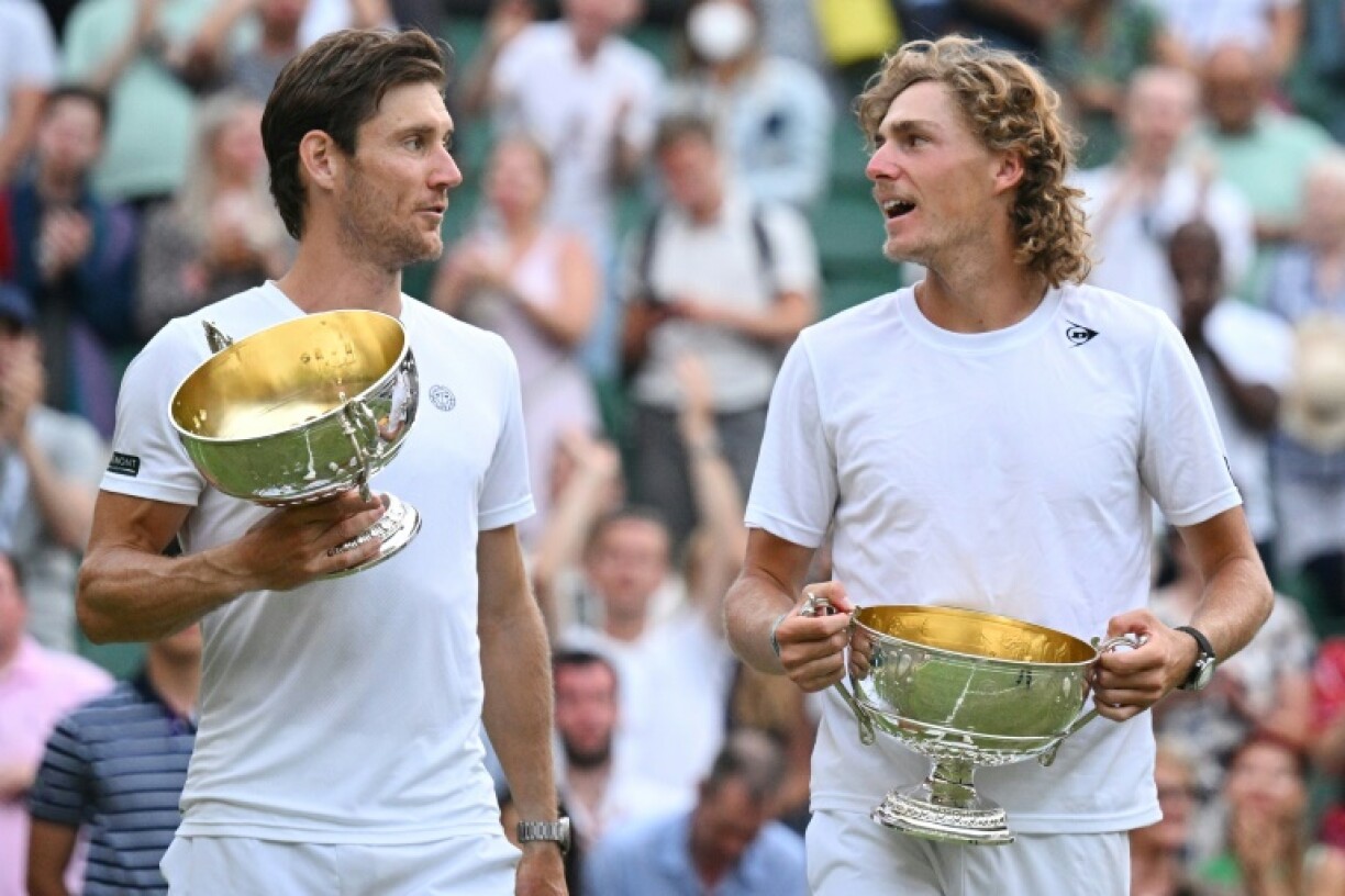 Australia's Max Purcell (right) celebrates winning the Wimbledon men's doubles title in 2022 with partner Matt Ebden