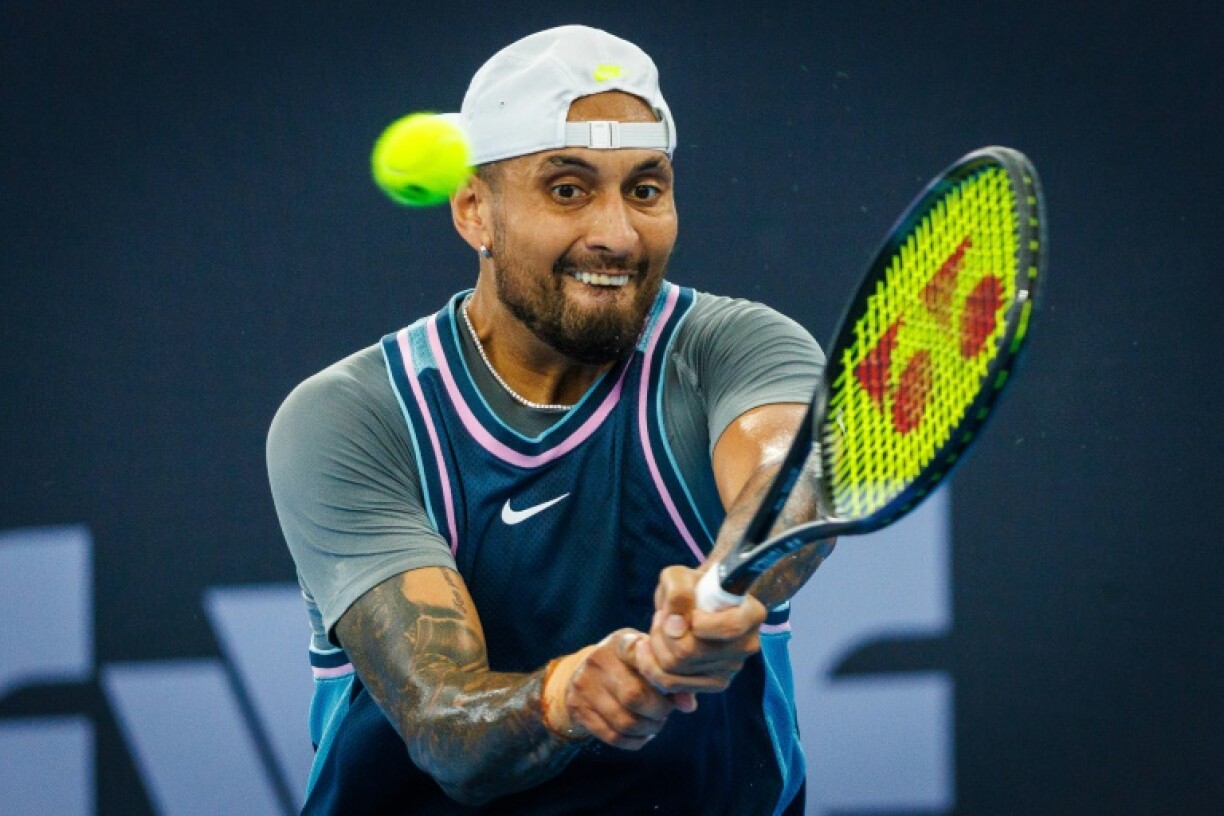 Australia’s Nick Kyrgios hits a return against France’s Giovanni Mpetshi Perricard