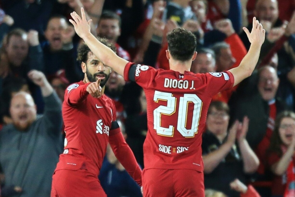 Liverpool forward Mohamed Salah (left) is mourning the death of teammate Diogo Jota