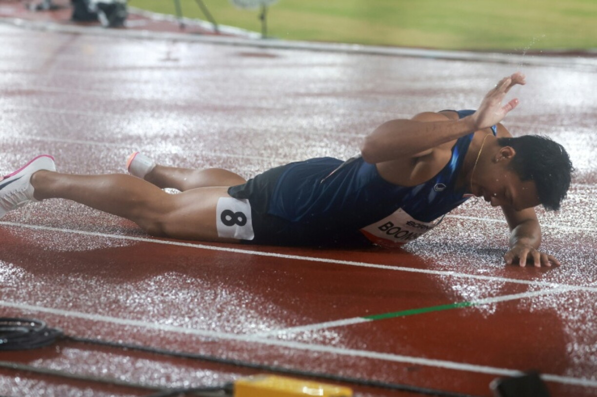 Thailand's Puripol Boonson celebrates setting an Asian record