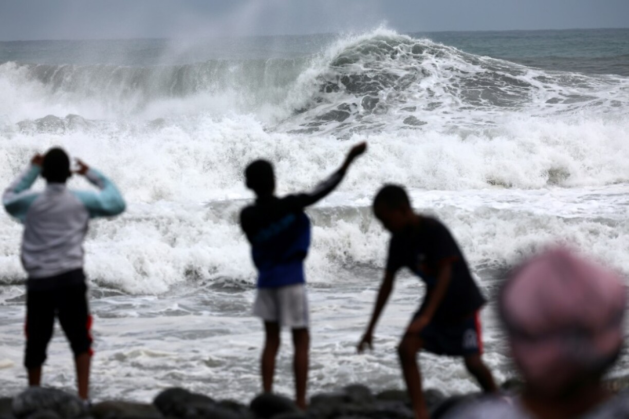 Children playing on the beach in Saint-Denis the day before Cyclone Garance was due to hit La Reunion