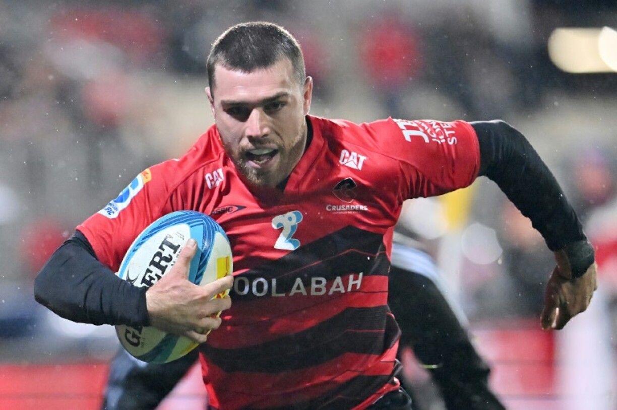 Kyle Preston of the Crusaders on the charge during their Super Rugby Pacific match against the Queensland Reds at Apollo Projects Stadium in Christchurch