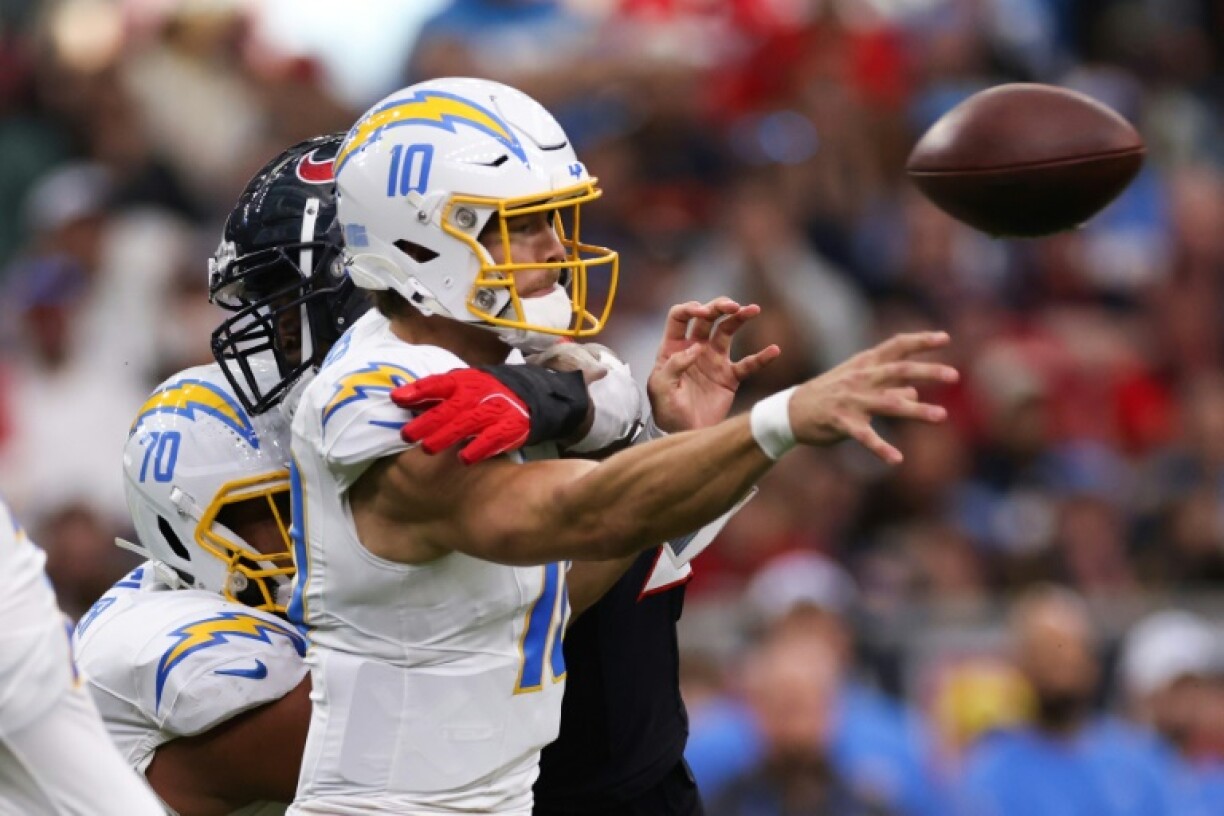 Justin Herbert threw four interceptions in his team's 32-12 loss to the Houston Texans in the AFC Wild Card playoffs.