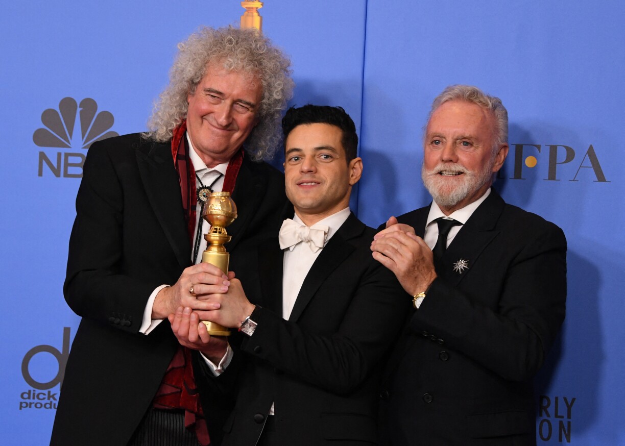 Vu lénks no riets: De Queen-Gittarist Brian May, de Schauspiller Rami Malik, deen de Freddie Mercury am Film