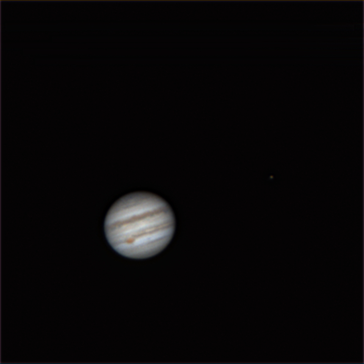 Jupiter and its largest moon, Ganymede.