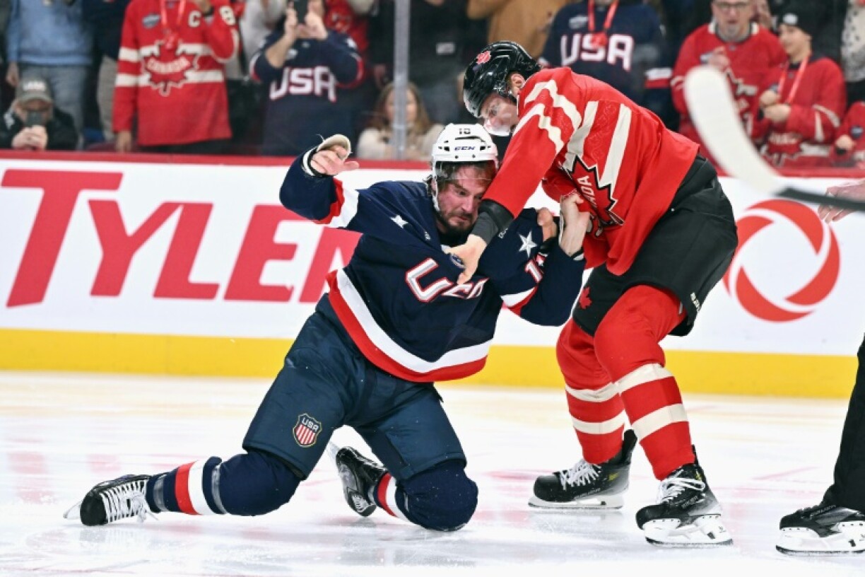 The USA's J.T. Miller (left) brawls with Canada's Colton Parayko during the NHL Four Nations tournament on Saturday; the two teams will meet again in Thursday's final