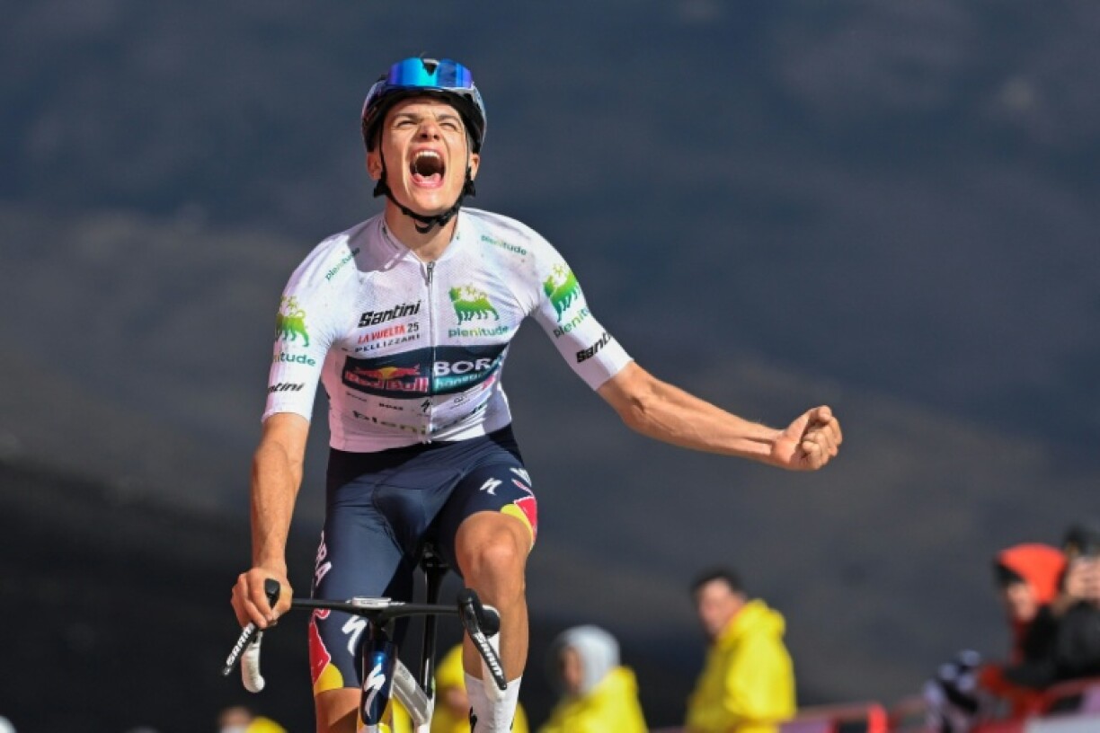 Young Italian rider Giulio Pellizzari celebrates his first big tour stage win