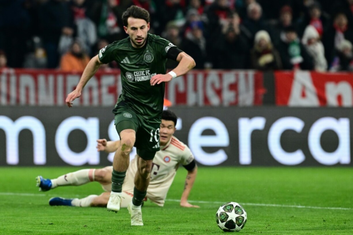 Celtic'd Nicolas Kuehn skipping away from Bayern centre back Kim Min-jae before scoring the opening goal