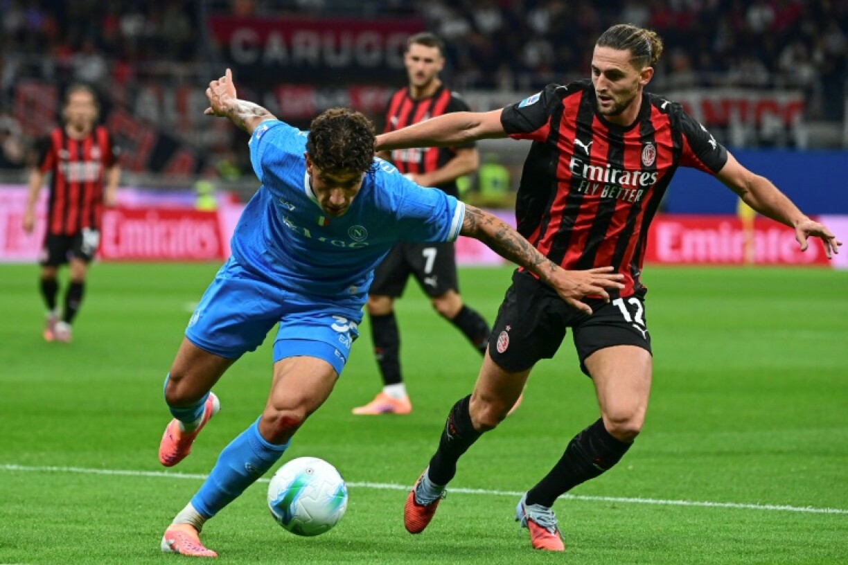 Adrien Rabiot (R) has criticised the plans for his club AC Milan to play Como in Australia