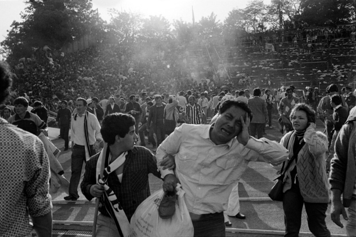 Thirty-nine football supporters died and some 600 were injured after a wall collapsed at the Heysel Stadium in the Belgian capital