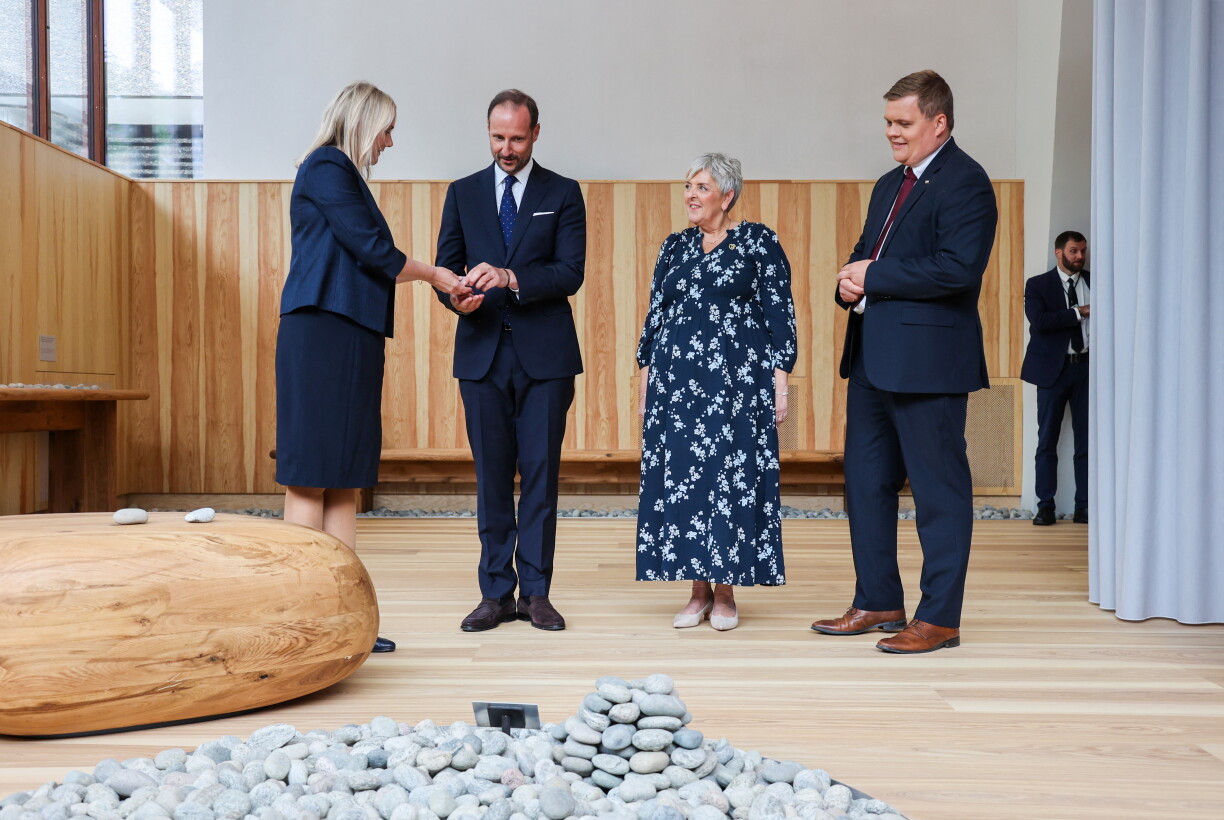 The director of the 22 July Center Lena Fahre gives a stone to Crown Prince Haakon of Norway as they and the leader of the National Support Group after 22 July Merete Stamneshagen and AUF leader Gaute Skjervo attend the opening of the national memorial site in remembrance of the victims of the terrorists attack at Johan Nygaardsvolds plass in the government quarter in Oslo, Norway, On July 19, 2026.