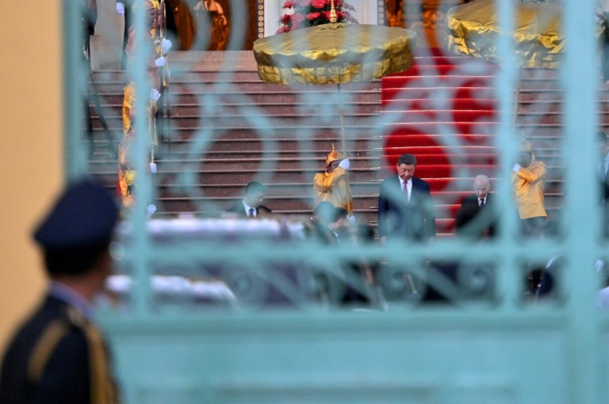 Chinese President Xi Jinping was greeted by Cambodia's King Norodom Sihamoni after he arrived in Phnom Penh to cap a three-stop tour of Southeast Asia