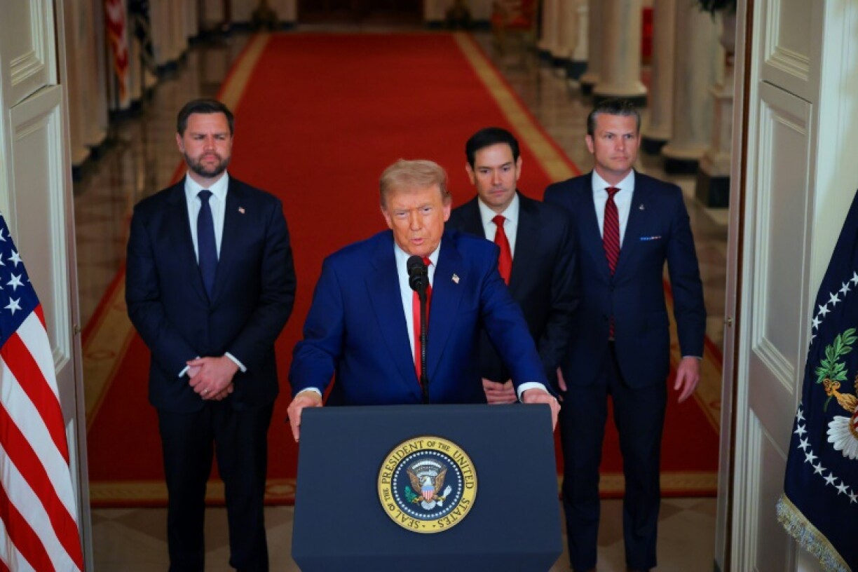 US President Donald Trump addresses the nation with members of his cabinet following the announcement that the US bombed nuclear sites in Iran