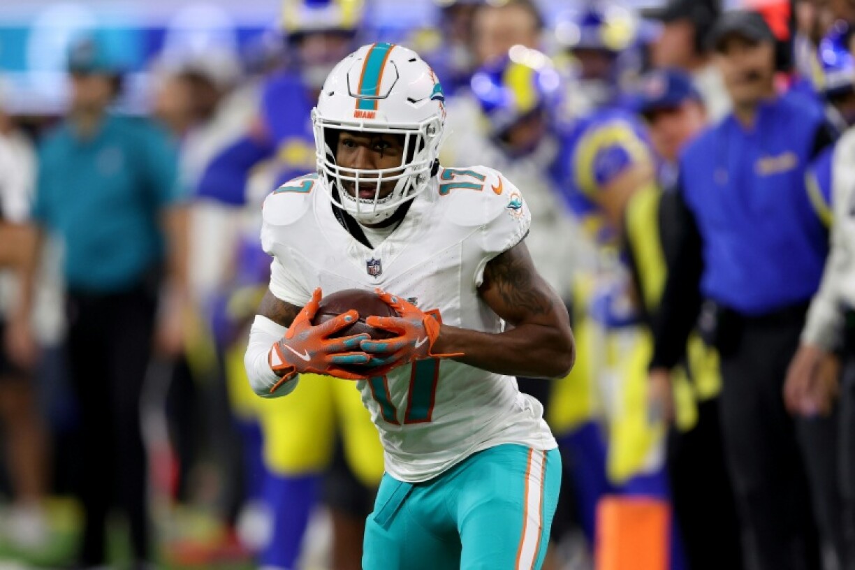 Jaylen Waddle of the Miami Dolphins runs with the ball during a game against the Los Angeles Rams at SoFi Stadium on November 11, 2024