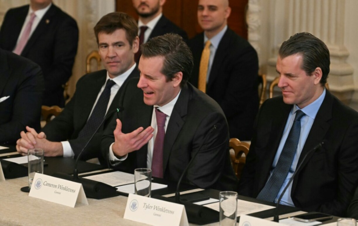 Twin brothers Tyler Winklevoss (R) and Cameron Winklevoss (2R) from Gemini crypto speak during the White House Crypto Summit