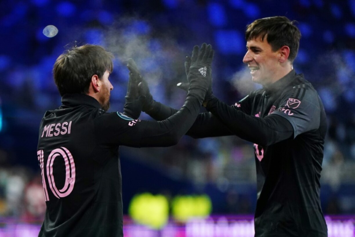 Lionel Messi (left) celebrates with Inter Miami teammate Tadeo Allende after scoring the winning goal in Inter Miami's CONCACAF Champions Cup win over Sporting Kansas City