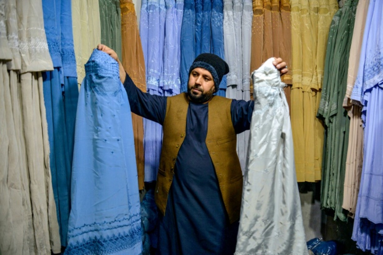 A burqa shop in Kandahar: it varies only in colour according to province, from blue to light brown, and green to pink