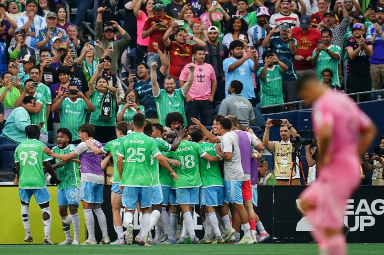 Seattle's Alex Roldan celebrates with Sounders teammates after scoring the second goal in their 3-0 victory over Inter Miami in the Leagues Cup final