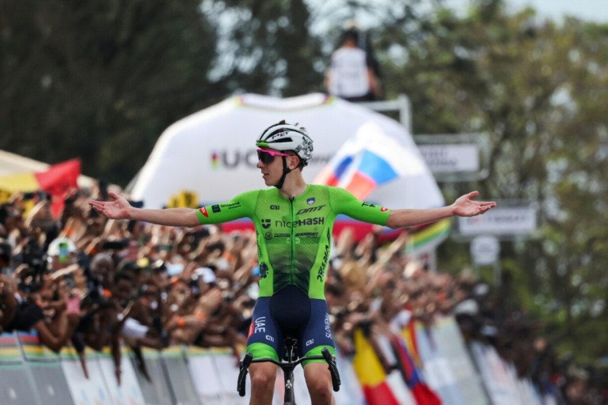 Tadej Pogacar defended his world title Sunday after a 66km break