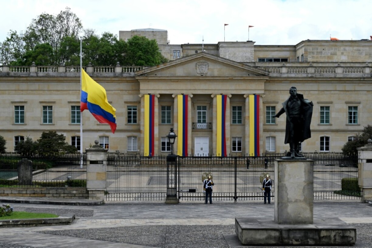 A Colombian national flag flies at half-mast outside Narino Presidential Palace following the death of Colombian presidential candidate Miguel Uribe in Bogota