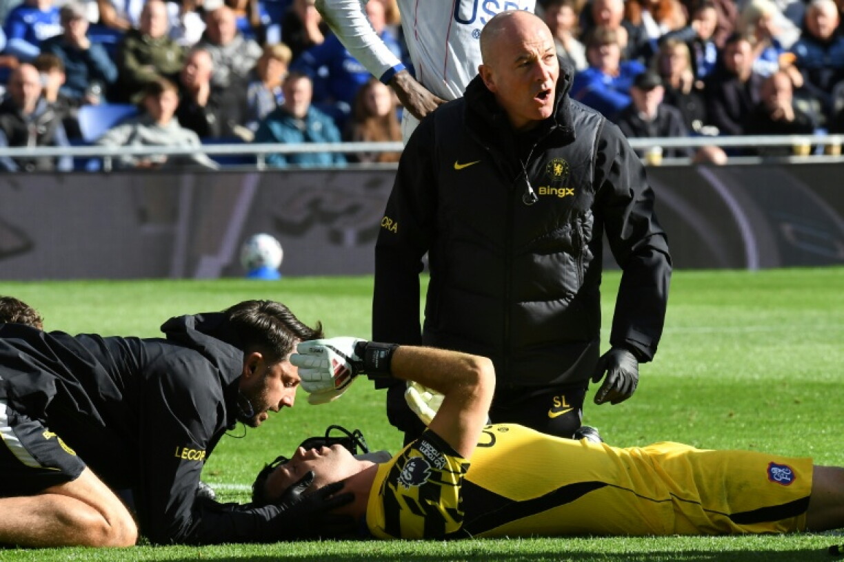 Emiliano Martinez was stretchered off during Chelsea's win at Everton