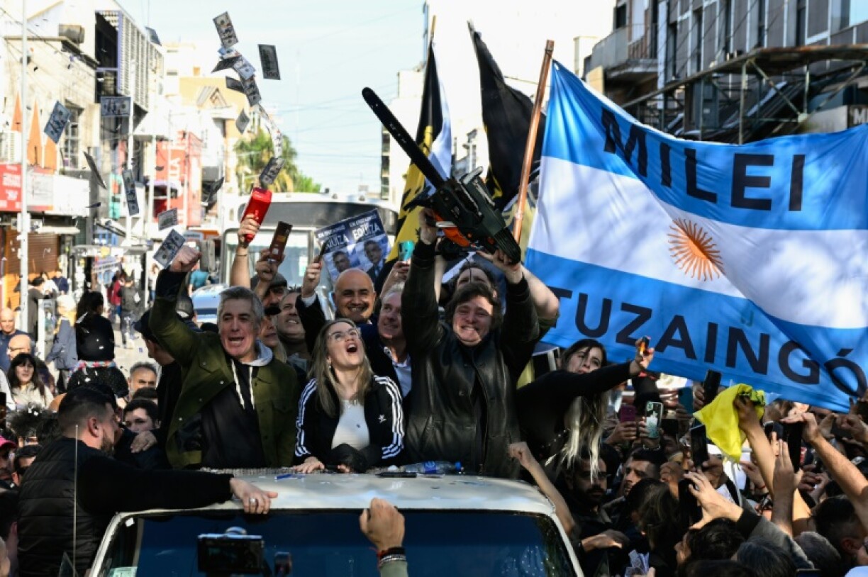 Javier Milei waves a chainsaw during a campaign rally in San Martin, Buenos Aires province, Argentina in September 2023
