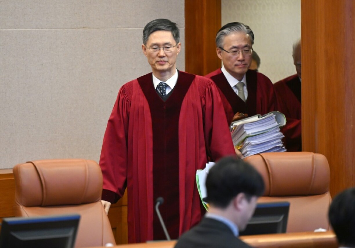 After weeks of fraught impeachment hearings at the Constitutional Court in Seoul, Tuesday's court session is Yoon's last before the eight judges go behind closed doors to decide his fate