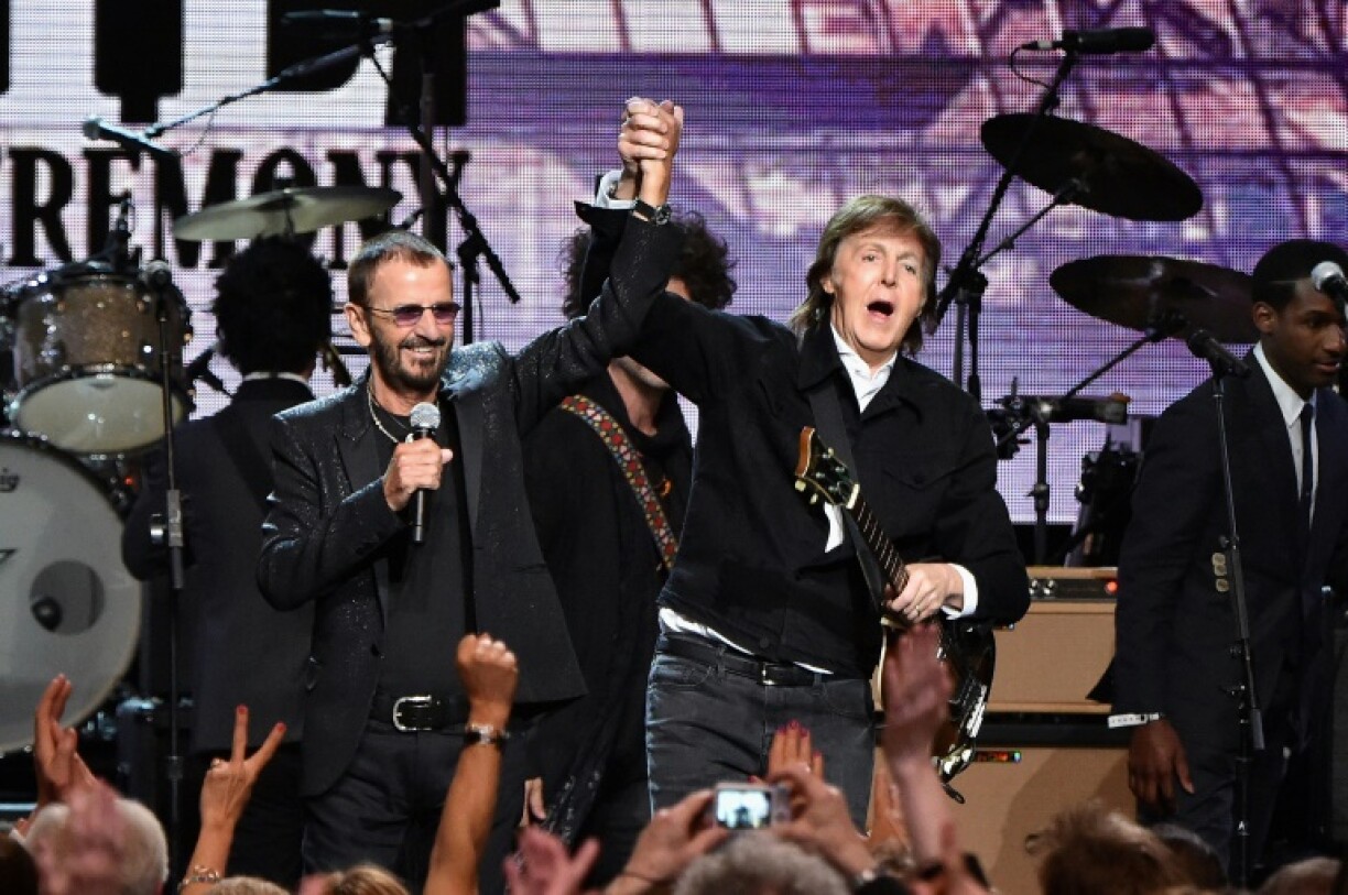 Paul McCartney (L) and Ringo Starr perform at the 2015 Rock And Roll Hall Of Fame Induction Ceremony