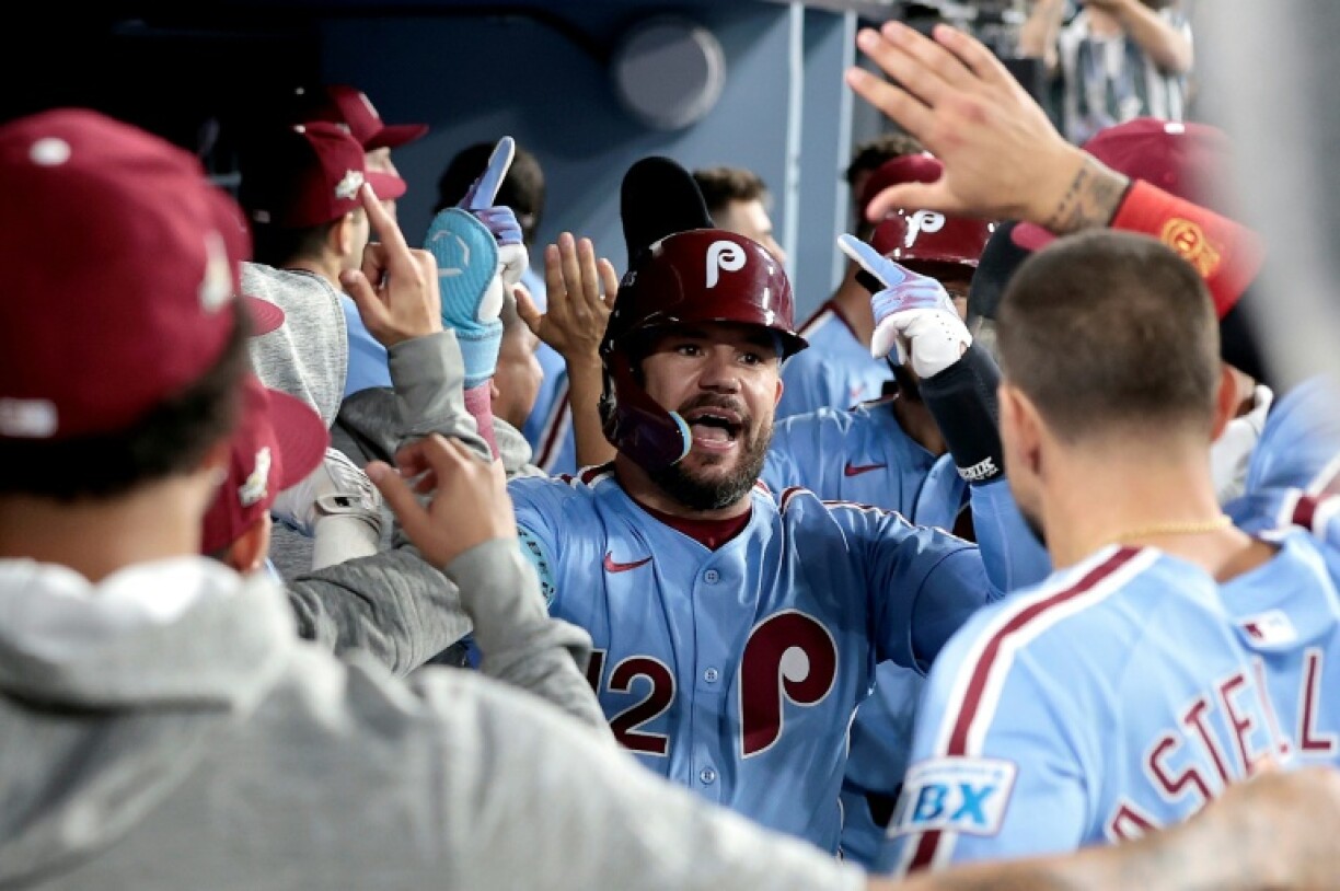 Kyle Schwarber of the Philadelphia Phillies reacts after a two-run home run in an MLB playoff victory over the Los Angeles Dodgers
